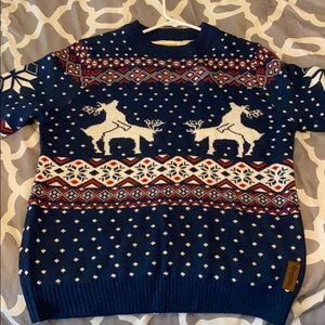 Ugly Christmas sweater. Reindeer love 😬.